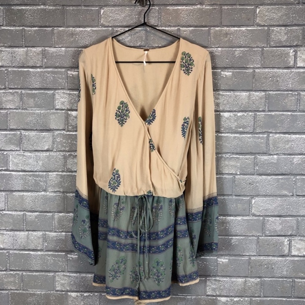 Free people romper with bell sleeves
